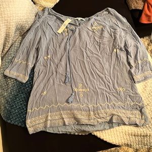 Pretty blue blouse with little round mirrors